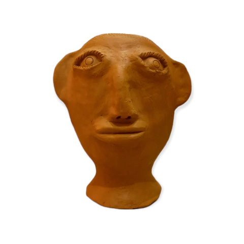Dona Irinéia and the Clay Memory of Quilombo Muquém, photograph