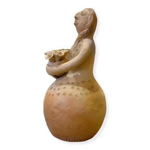 Dona Irinéia and the Clay Memory of Quilombo Muquém, photograph